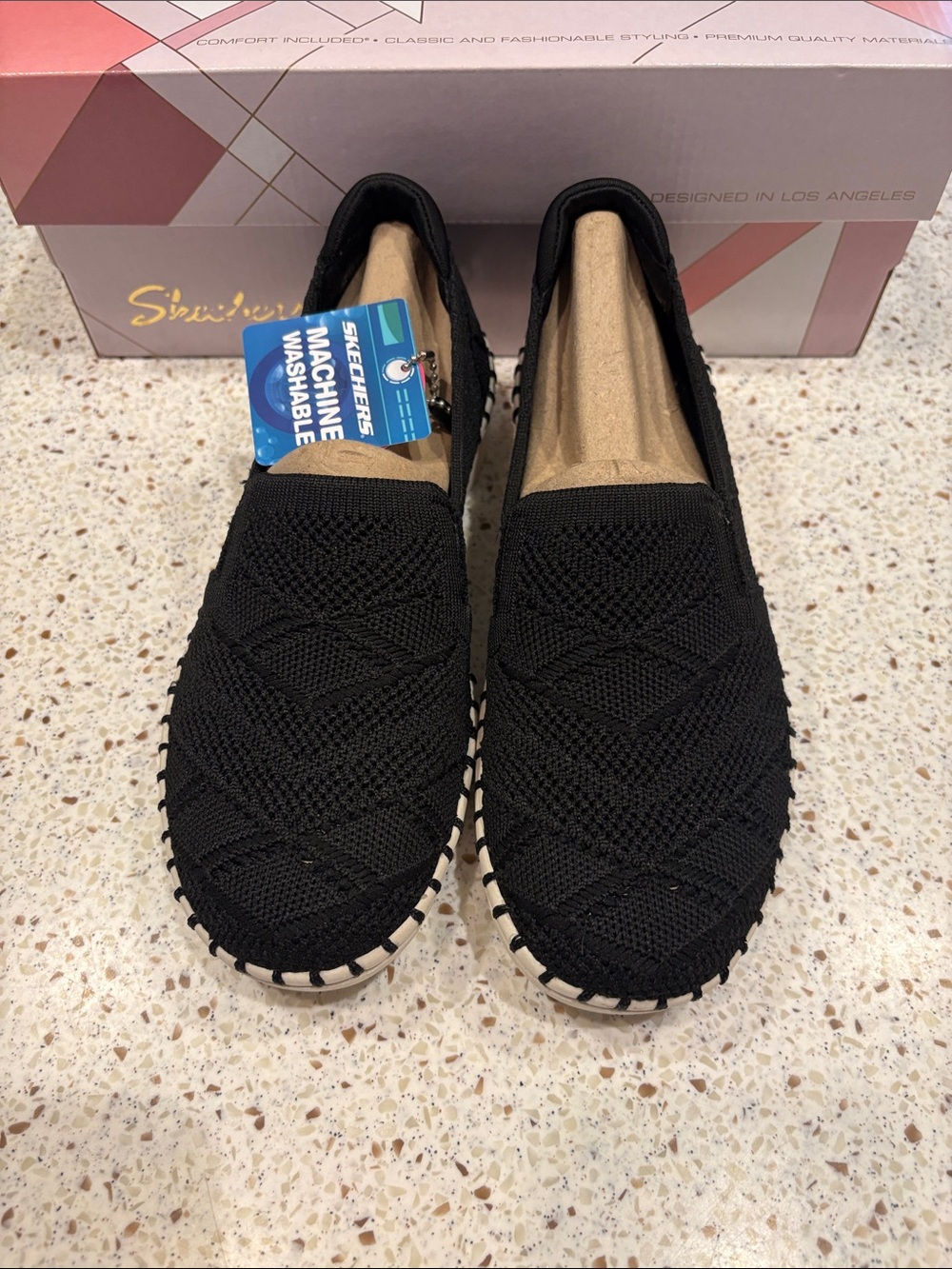 Skechers Black Knit Slip-On Sneakers with White-Trim Sole